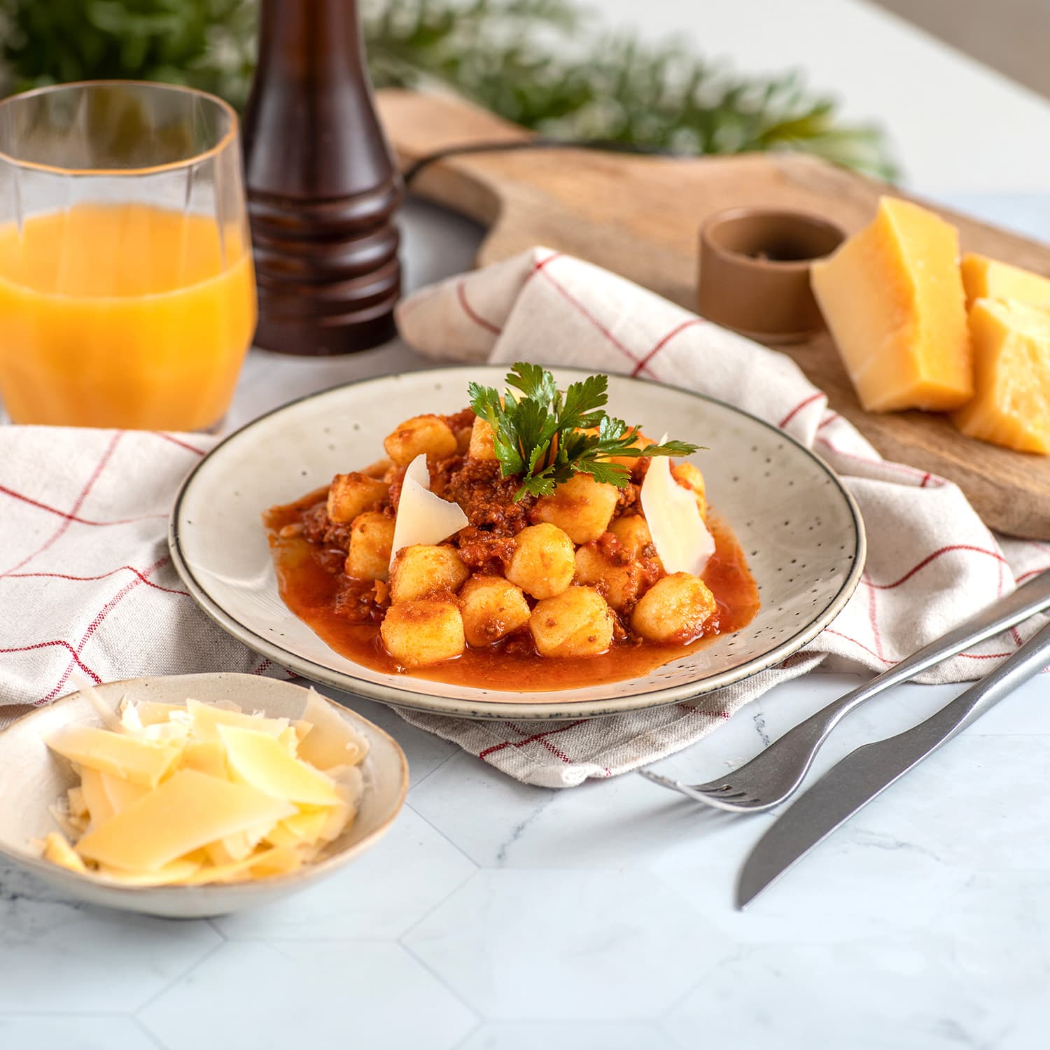 Ñoquis de Papas con Salsa Bolognesa